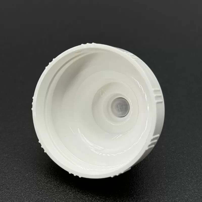 38/400 dispensing cap with silicone valve