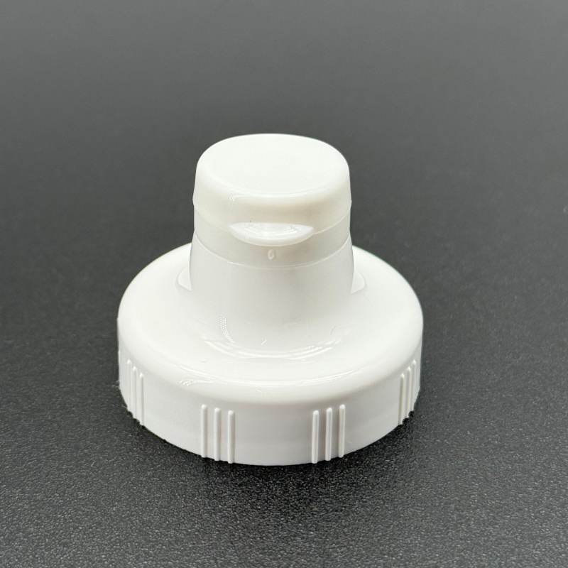 leak proof dispensing cap with silicone valve